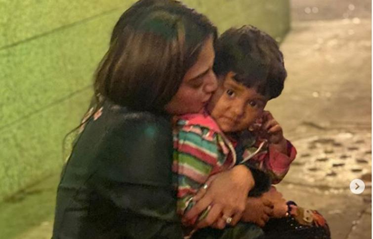Nusrat Jahan shares cute image with balloon-selling baby boy, fans love it