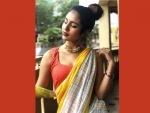 Wink Girl Priya Varirer is back to win hearts by posting her image in traditional sari avatar
