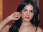 Sunny Leone looks stunning in her latest video, seen sporting red strap dress