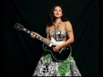 With guitar in her hand, Sunny Leone looks stunning in her latest Twitter imagesÂ 