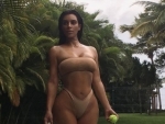 Bikini clad Kim Kardashian shows fans how to play Tennis in bold way: Check out pics
