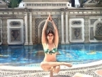 Setting fitness goals: Pooja Batra performs yoga by the swimming pool