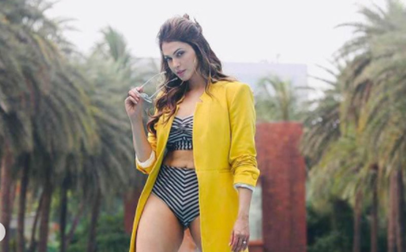 Isha Koppikar looks stunning in zebra-print swimsuit, images go viral on Instagram 