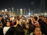 Kartik Aaryan shakes leg with fans at the world famous fountain area in Dubai Mall for Bhool Bhulaiyaa 2 title track