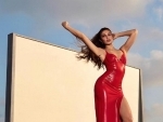 Jacqueline Fernandez looks red hot in high-slit dress