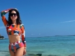 Sunny Leone shows you the perfect way to save your arms and shoulders from burning when visiting a sea beach