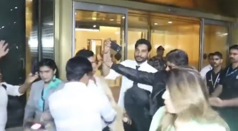 Shah Rukh Khan pushes his 'fan' refusing to take selfie at airport