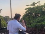 SRK greets fans outside Mannat with son AbRam on Eid