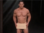 John Cena surprises all by appearing almost naked on stage to present Oscars award