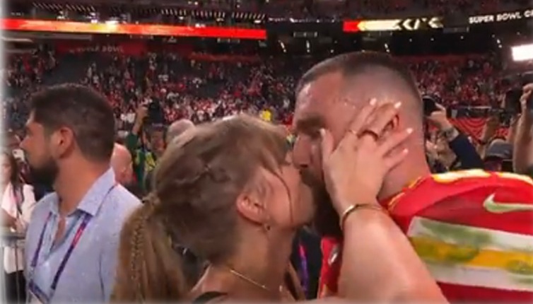Singing sensation Taylor Swift kisses and hugs Travis Kelce after Kansas City Chiefs' Super Bowl victory in Las Vegas
