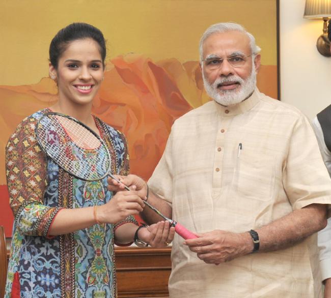 Saina Nehwal meets PM Narendra Modi, presents him badminton racquet