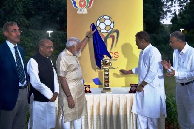 Prime Minister unveils BRICS U-17 trophy