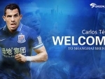 Argentine striker Carlos Tevez joins China's Shanghai Shenhua for a hefty fee 