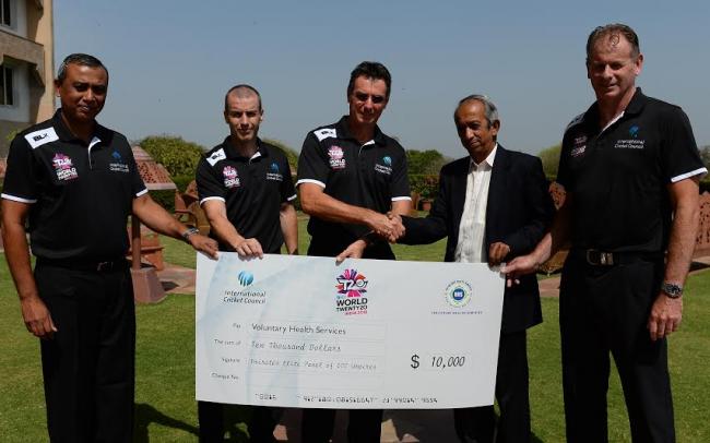 Elite umpires donate US$10,000 to Voluntary Health Services charity