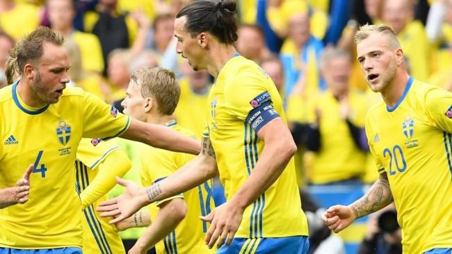 Clark own goal salvages point for Sweden