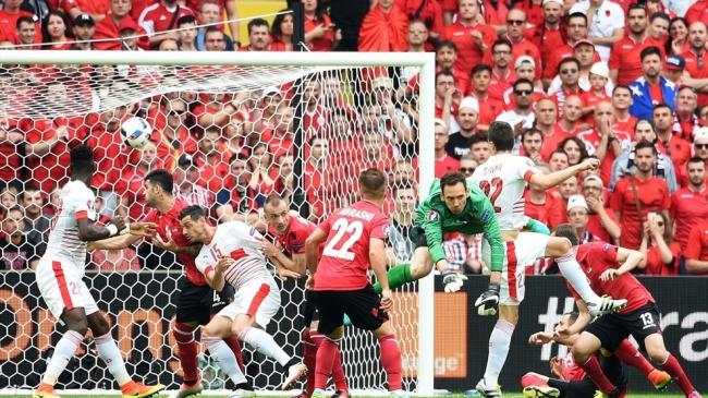 Switzerland hold on against ten-man Albania
