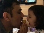 MS Dhoni shares cute laddoo-eating video with his daughter on social media