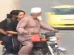 Pakistani woman cricketer returns home on motorbike