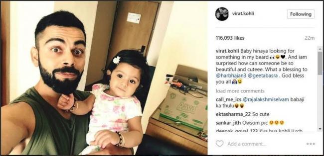 Virat Kohli clicks a selfie with Harbhajan Singh's daughter