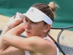 Simona Halep survives epic battle against Lauren Davis in Australian Open clash