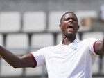 Jason Holder adds a record to his bag during the second Test against India