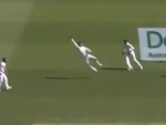 Virat Kohli takes a stunning catch during Australia first innings