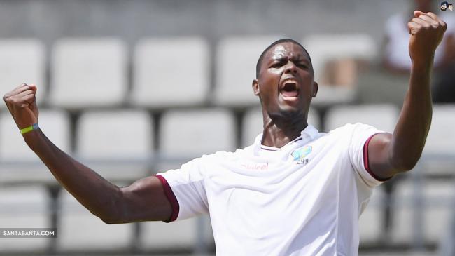 Jason Holder adds a record to his bag during the second Test against India