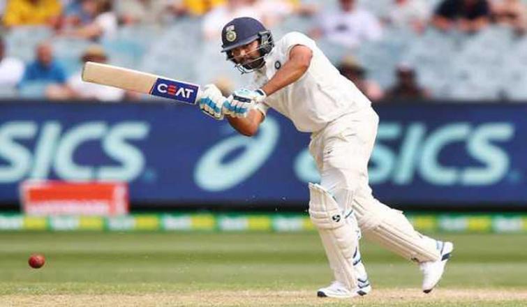 Rohit Sharma's ton puts India in drivers seat, rain forces early stumps