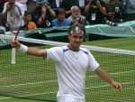 Australian Open: Roger Federer beats Britain's Dan Evans in 2nd round clash