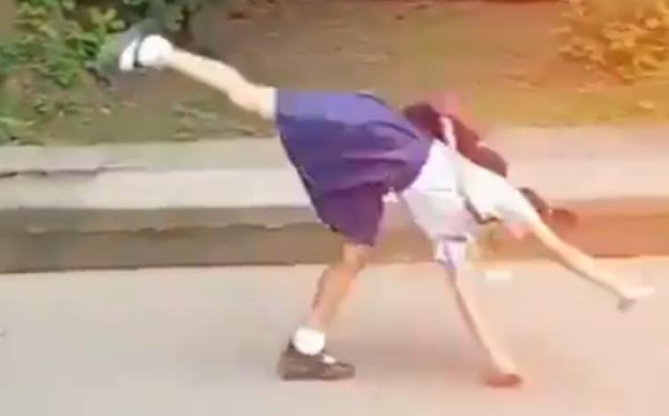 Two school children doing Somersault on streets win Nadia Comaneci's heart