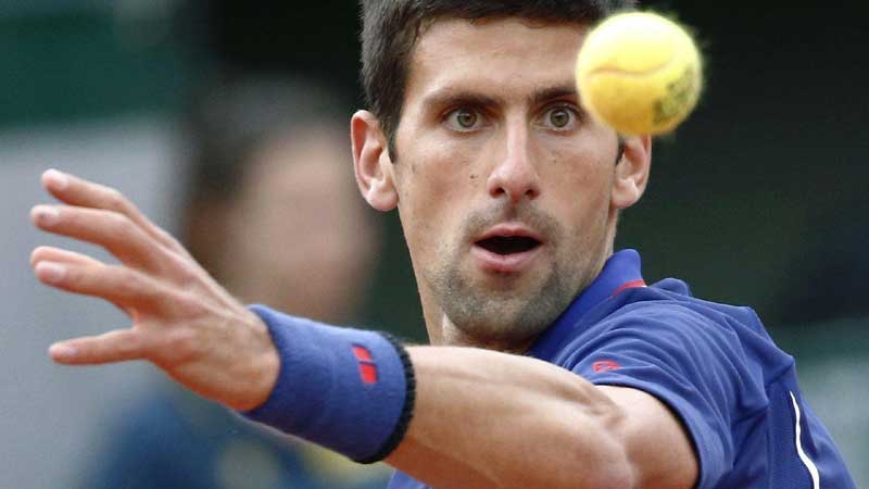 Djokovic thrashes Berankis to cruise into French Open third round