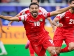 Jordan overturn 10-man Iraq, hosts Qatar edge Palestine in AFC Asia Cup challenge
