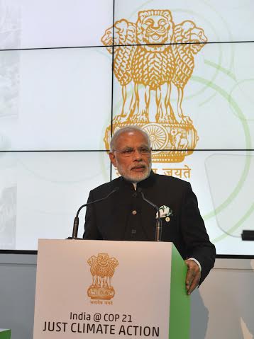 Narendra Modi being received by the President of France