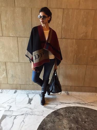 Deepika gets her initails on the Burberry Poncho