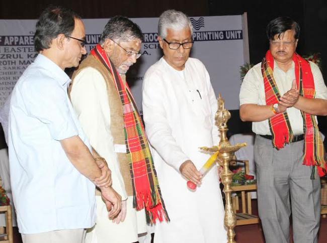 Santosh Kumar Gangwar lighting lamp for inauguration