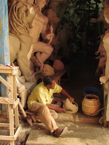 Artisans give final touches to Durga idols in Kumartoli