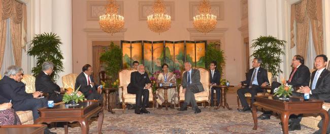 Narendra Modi being received by the Prime Minister of Singapore