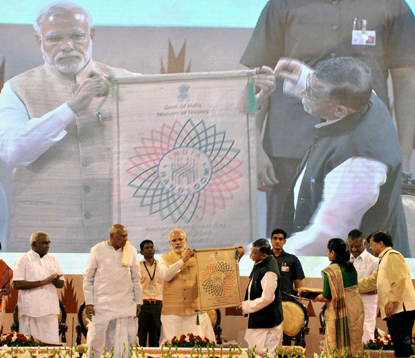 Narendra Modi being received by the Governor of Tamil Nadu