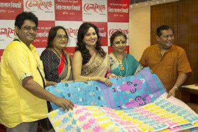 Saree store launches new line themed on Tollywood superhit Bela Seshe 