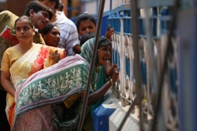 Tallest Durga: People take a peek through opening
