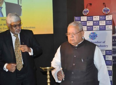 Kalraj Mishra lighting the inaugural lamp