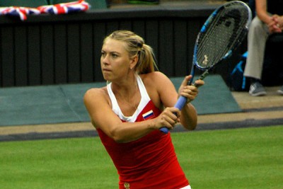 Sharapova survives huge scare, cruises to next round