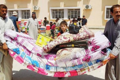 Iraq: As fighting intensifies, UNWFP rushes supplies to thousands displaced