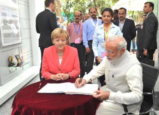 Narendra Modi and the German Chancellor, Dr. Angela Merkel visiting the Robert Bosch Engineering & Innovation Centre, in Bengaluru