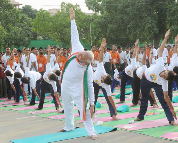 PM Modi leads mass yoga demonstration in Delhi on first International Yoga Day