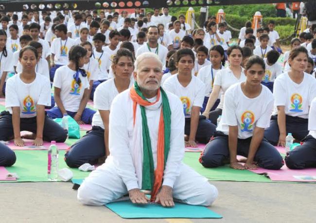 PM Modi leads mass yoga demonstration in Delhi on first International Yoga Day