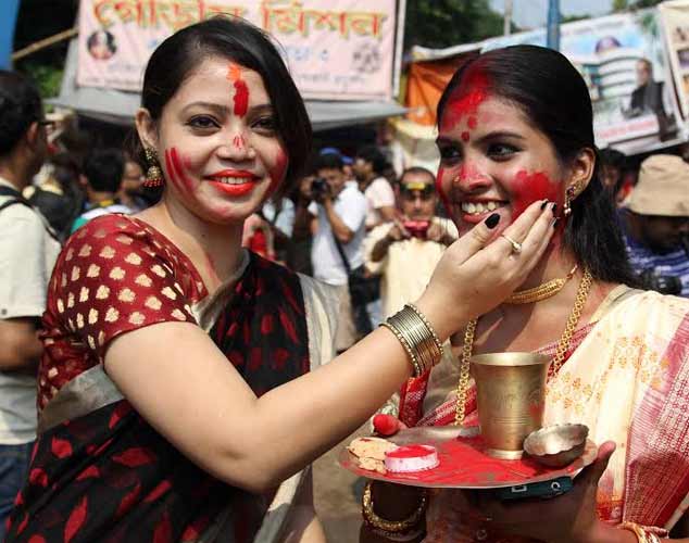 Revellers bid adieu to Goddess Durga on Maha Dashami