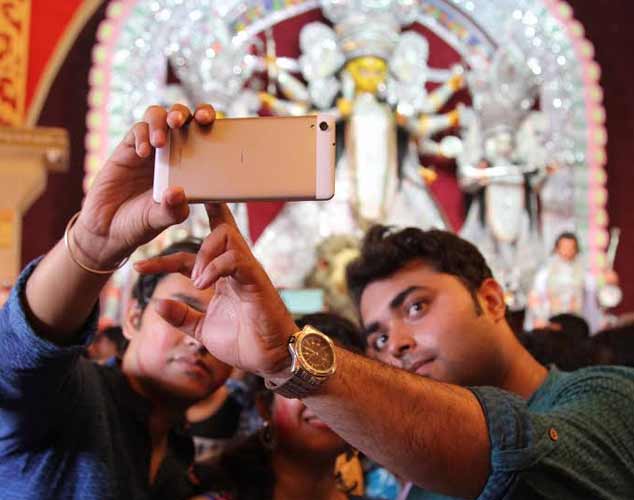 Revellers bid adieu to Goddess Durga on Maha Dashami