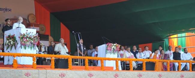 Narendra Modi being received by the Governor of Assam