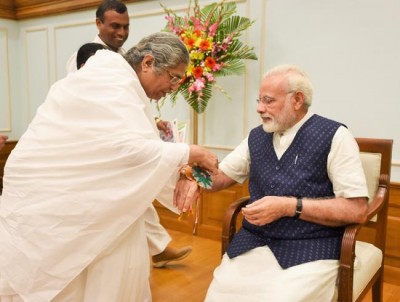 Women,  children tie Rakhi on PM's wrist on the occasion of Raksha Bandhan